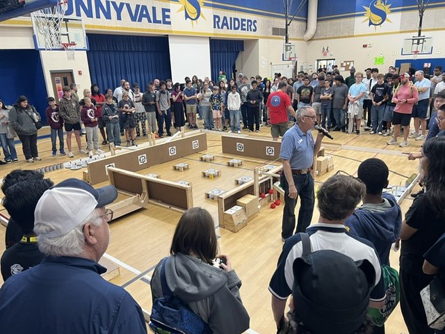 Teams gathered around the Byte to Bite game field at the 2026 season kickoff